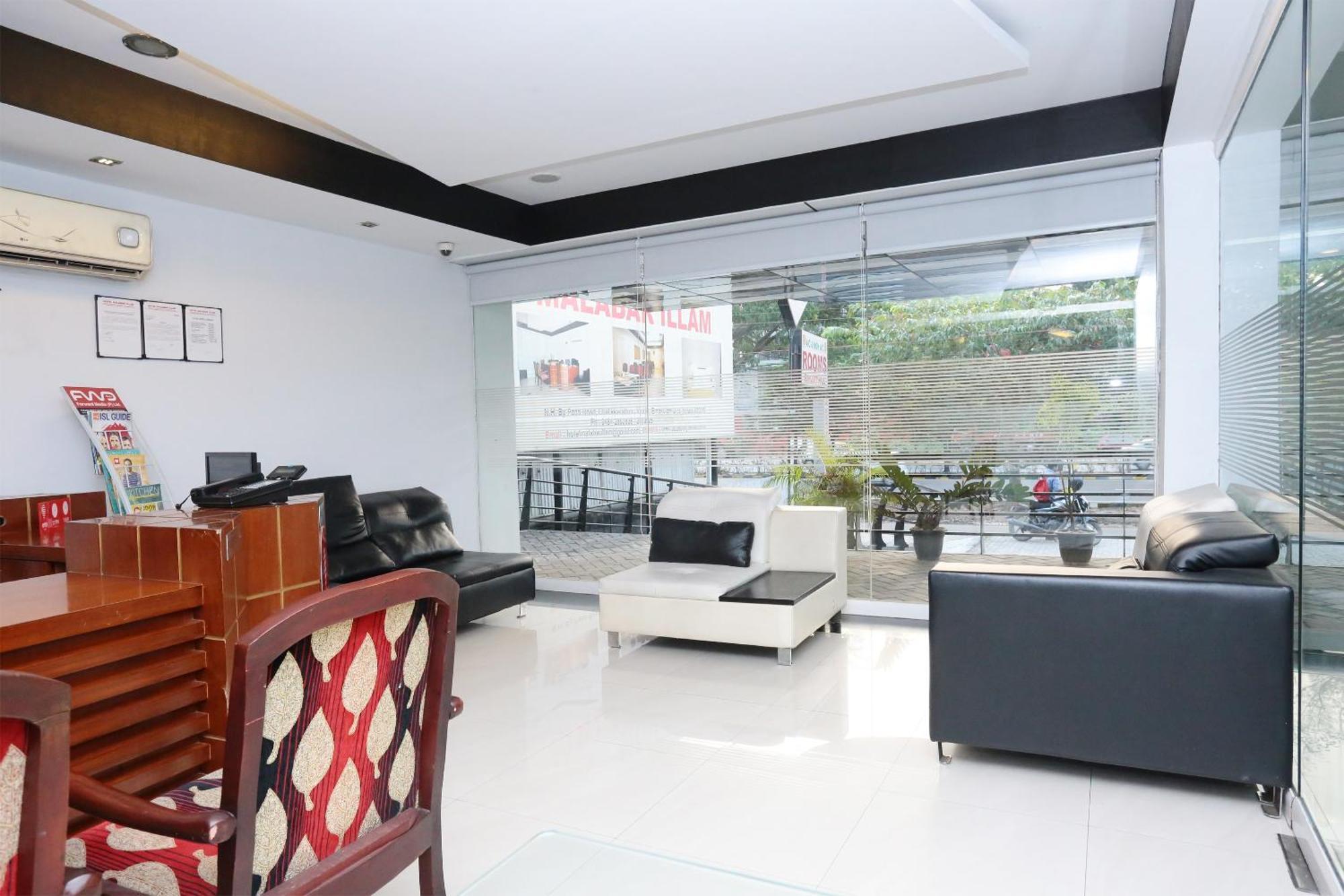 Super Townhouse Malabar Illam Hotel Kochi Exterior photo